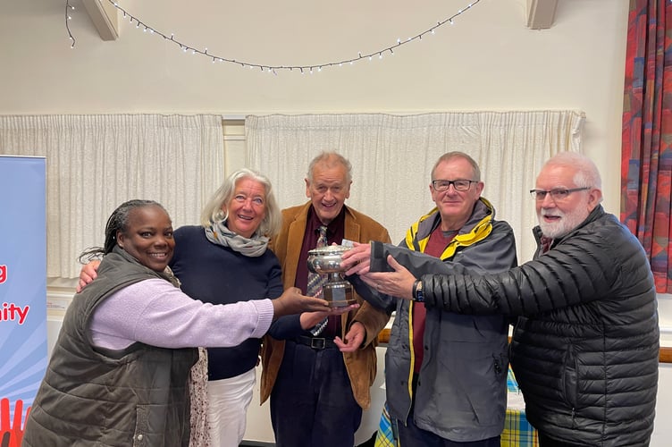 From left, Cllr Jocelyne Whittaker, Cllr Monika Herpoldt-Bright, Cllr John Dean, Cllr Jock Campbell receiving the Mary Mortimer Trophy from Paul Collier, centre